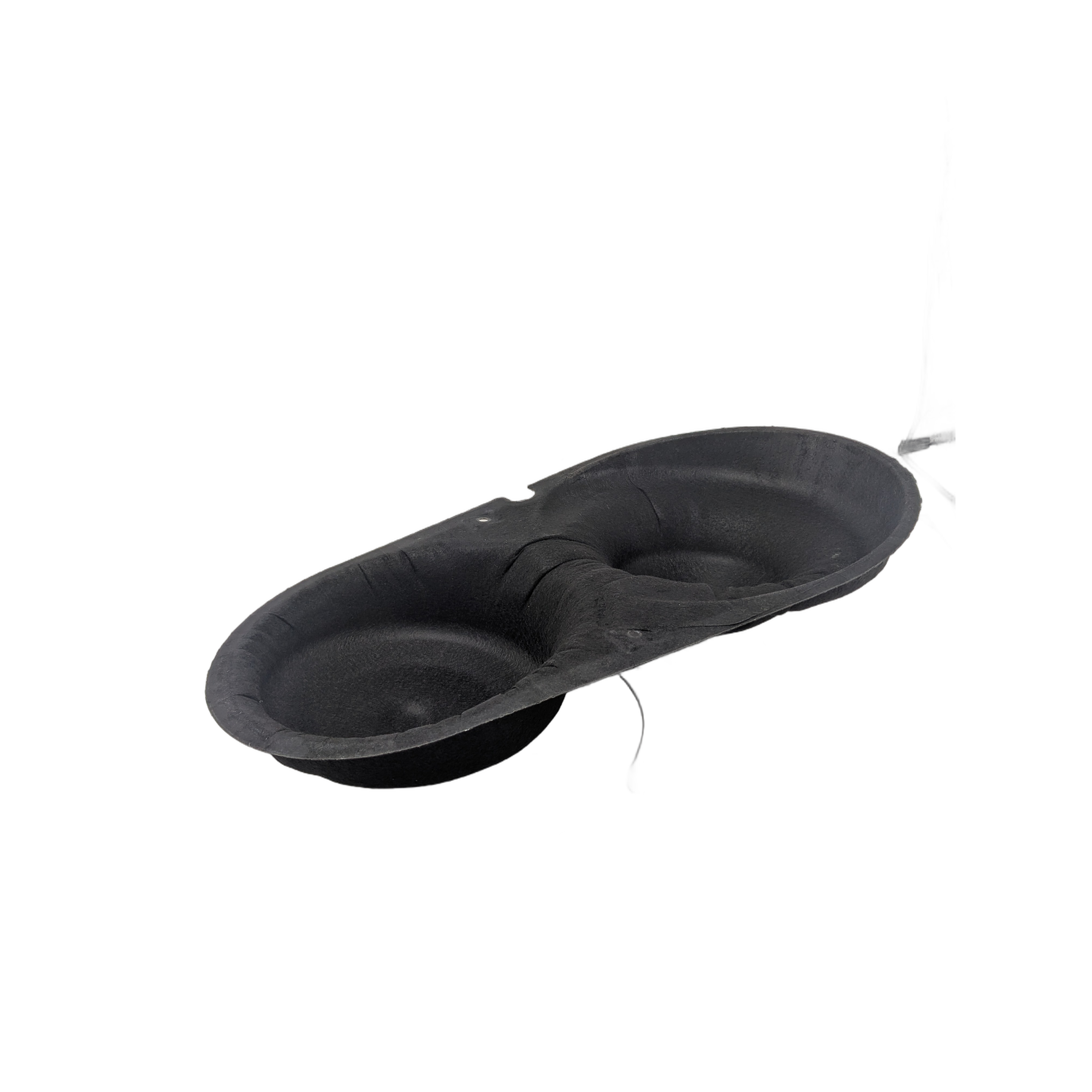 Black molded insulating mat with two circular depressions and a flexible wire attached.
