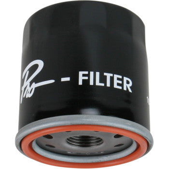 The Oil Filter by Parts Unlimited is a black cylindrical filter with a silver base and orange gasket, featuring partial white "FILTER" text and stylized writing, designed to meet OEM performance requirements.