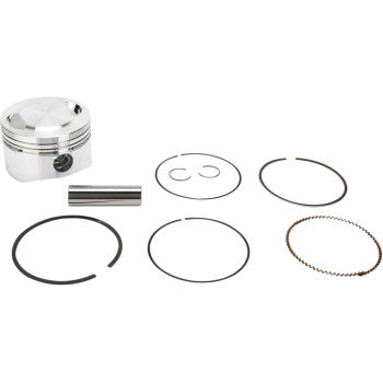 A Yamaha Piston Kit 83.00 mm by Wiseco, including a pin, two circular clips, and four piston rings of different thicknesses for 4-stroke engines, is displayed on a white background.
