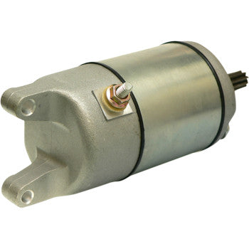 The Starter Motor by Parts Unlimited is a cylindrical metal motor featuring a mounting flange, insulated armature, threaded terminal, and gear at one end—ideal for OEM starters—and is displayed against a white background.