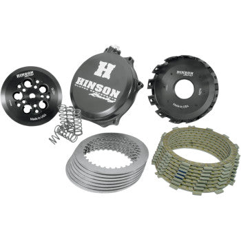 The Clutch Kit by Hinson Racing for motorcycles includes a billet T-6 aluminum clutch cover, pressure plate, springs, steel plates, and friction discs—all displayed on a white background to showcase enhanced heat dissipation and performance.