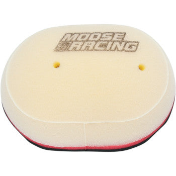 The Arctic Cat Air Filter by Moose Offroad is a beige, oval, two-layer foam filter with Moose Racing on top, two small upper-center holes, and a pink and black base for maximum protection.