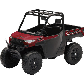 The Polaris Ranger XP1000 EPS 1:18 Scale Model by New Ray Toys is shown in black and red with large rugged wheels, an open cabin, and a flatbed cargo area from a front-side angle.
