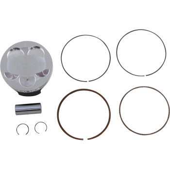 Polished silver piston with four valve reliefs, two black piston rings, one bronze-colored oil ring, wrist pin, and two.