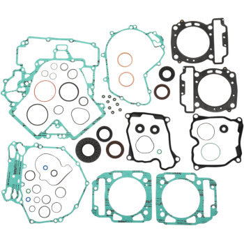 The Can Am Motor Gasket Kit with Oil Seal by Moose Offroad features assorted green, black, and copper OEM replacement gaskets and seals for engine rebuilds, all arranged on a white background to ensure reliable offroad performance.