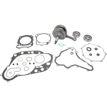 The Suzuki Crankshaft Kit OE Replacement by Hot Rods includes a crankshaft, connecting rod, gaskets, and bearings, all arranged on a white background and designed to meet OEM specifications.