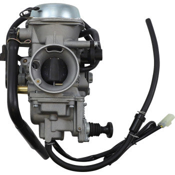Silver and black metal Honda replacement carburetor with attached fuel lines and connectors for offroad vehicles.
