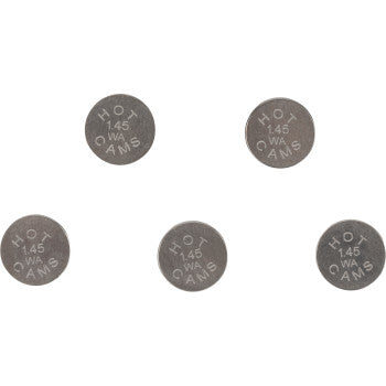 Five round metallic valve shims with engraved markings "Hot Cams 1.45" arranged on a white background.