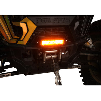 Close-up of an off-road vehicle's front bumper featuring the Moose Offroad 8" LED Light Bar Amber (waterproof and illuminated), a winch system below, and a rugged tire visible on the right.