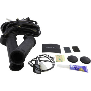 The Apollo Heated Grips 7/8" x 130 mm Thumb Warmer by Koso North America includes black grips, plug-and-play wiring, adhesive pads, thumb control switches, rubber caps, glue tube, and small black parts shown on a white background.
