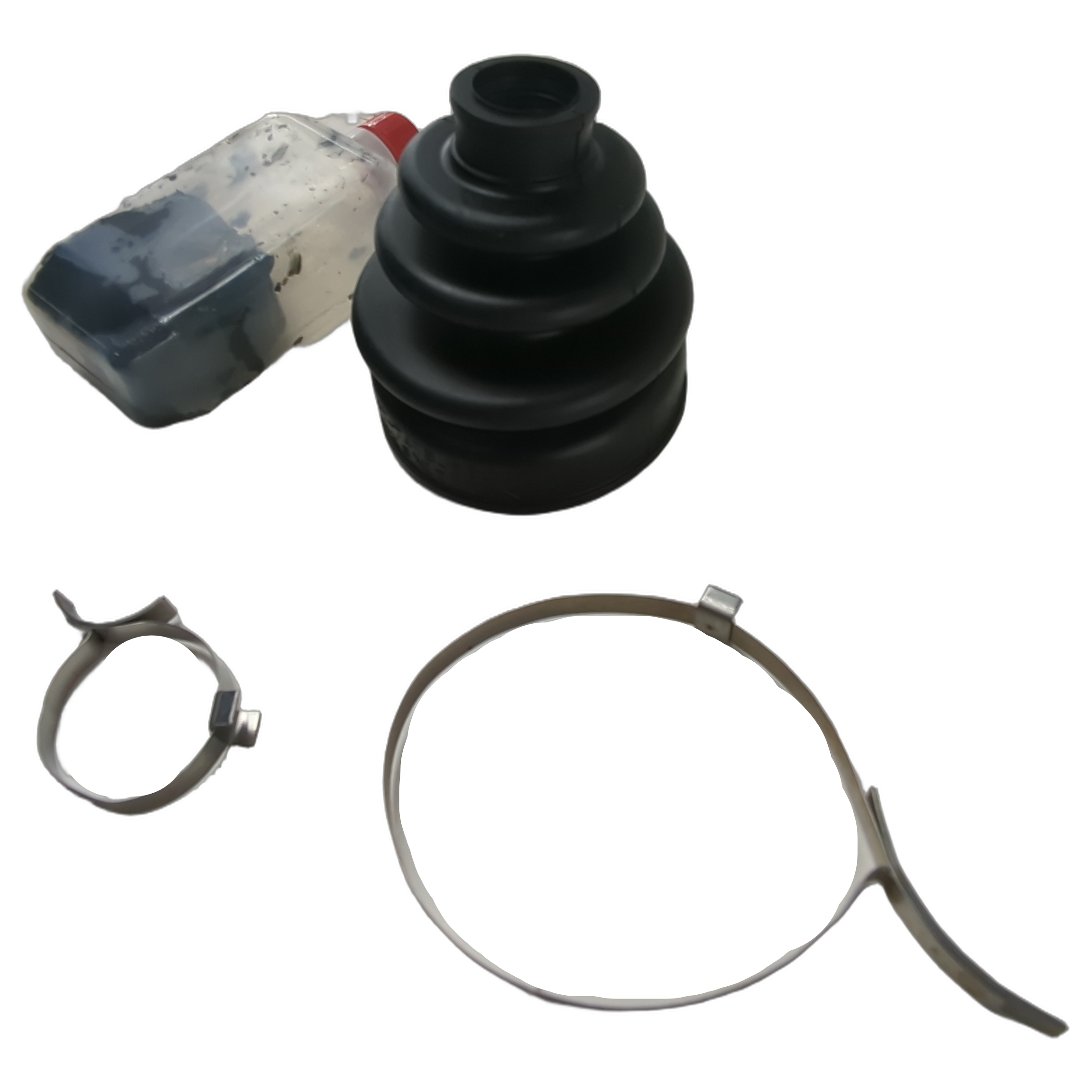 Black rubber CV boot with accordion-style folds, accompanied by two metal clamps and a small plastic container with grease.