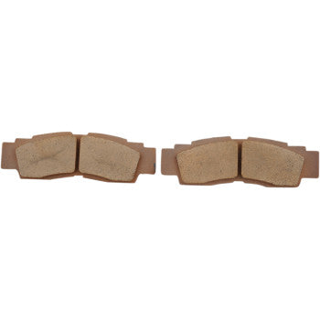 Two rectangular Yamaha YXZ Standard Brake Pads by Dp Brakes, each with two distinct friction material segments and textured surfaces, are shown side by side on a white background.