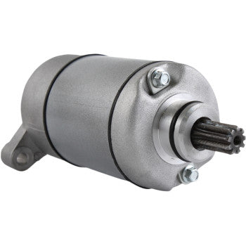 A close-up of the Starter Motor by Parts Unlimited shows its metallic, cylindrical body with a mounting bracket, copper bushings, and exposed gear teeth at one end.