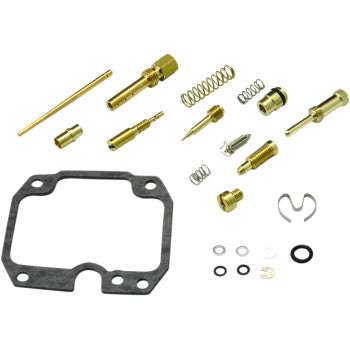 The Kawasaki Carburetor Repair Kit by Shindy includes assorted small metal parts, float valves, jets, springs, seals, washers, and a gasket, all neatly arranged on a white background.