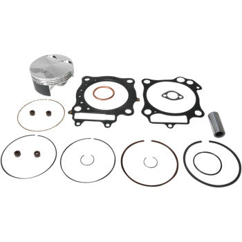 The Honda Piston Kit with Gaskets 94.00 mm by Wiseco includes pistons, a top-end gasket kit, rings, and pins, all displayed on a white background.