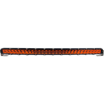 The Light Bar 30" Spot Curved by Heretic is a slim, curved LED light bar with a black casing and bright orange lights, mounted on durable stainless steel, shown front-facing against a white background.