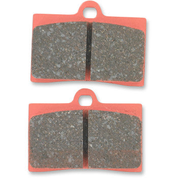 Two rectangular Ebc Semi-Sintered Brake Pads with copper-colored backs and gray friction surfaces, each split by a central groove and equipped with a small circular mounting tab at the top.