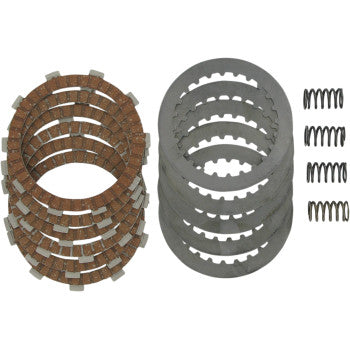 Set of brown friction clutch plates, silver steel plates, and small coil springs for offroad vehicle maintenance.