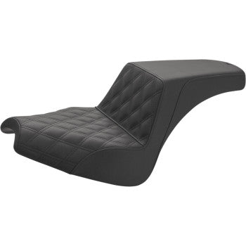 Black motorcycle step-up seat with front lattice stitch and smooth rear panel, contoured for comfort.