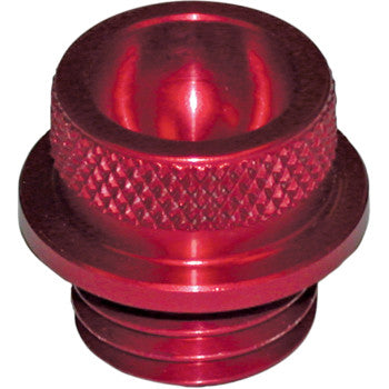 The Red Oil Fill Cap by Pingel is a red, metallic, billet aluminum plug with knurled sides and threading at the bottom, designed to screw into oil fill openings for a secure, leak-proof seal.