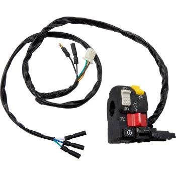 Black plastic Honda switch block assembly with red and yellow buttons and a coiled black wire harness.