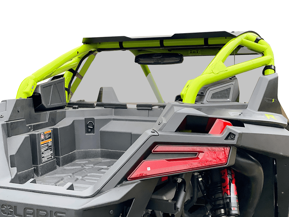 Rear view of the Polaris Pro-R Vented Tinted Rear Windshield by Spike, showing bright yellow roll bars for protection and visibility, a gray interior cargo area, and red tail light against a plain light background.