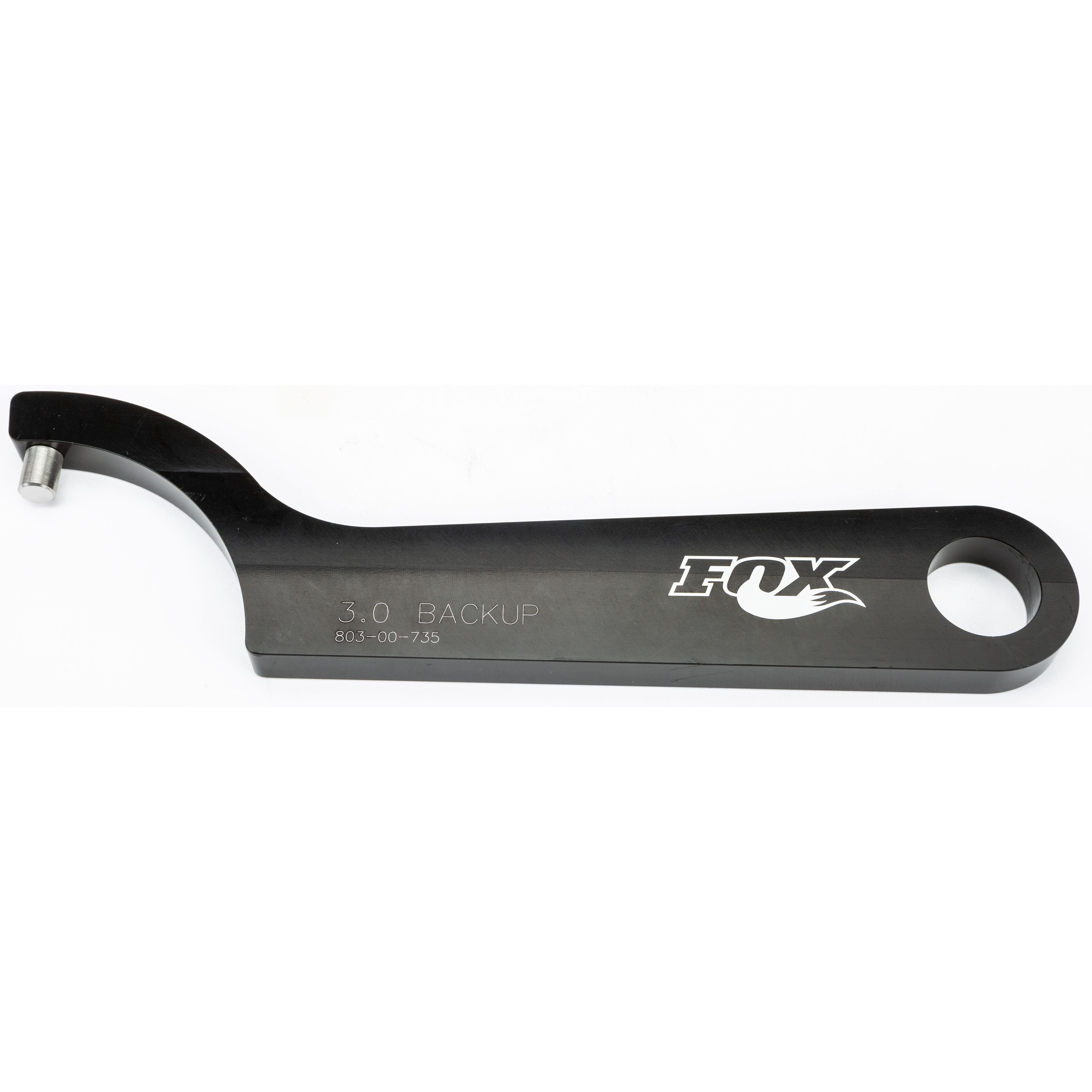 The Spanner Wrench 3.0 Backup by Fox is a black metal tool with a hook end, engraved with "3.0 BACKUP" and "803-00-735," shown on a white background.