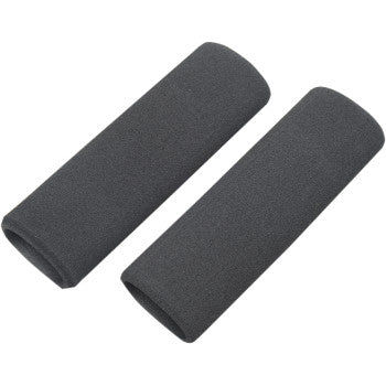 Two black Grip Covers 1-1/4" x 5" Long by Grab On are shown side by side on a white background, offering durable, shock-absorbing EPDM foam grips ideal for motorcycle handlebars.