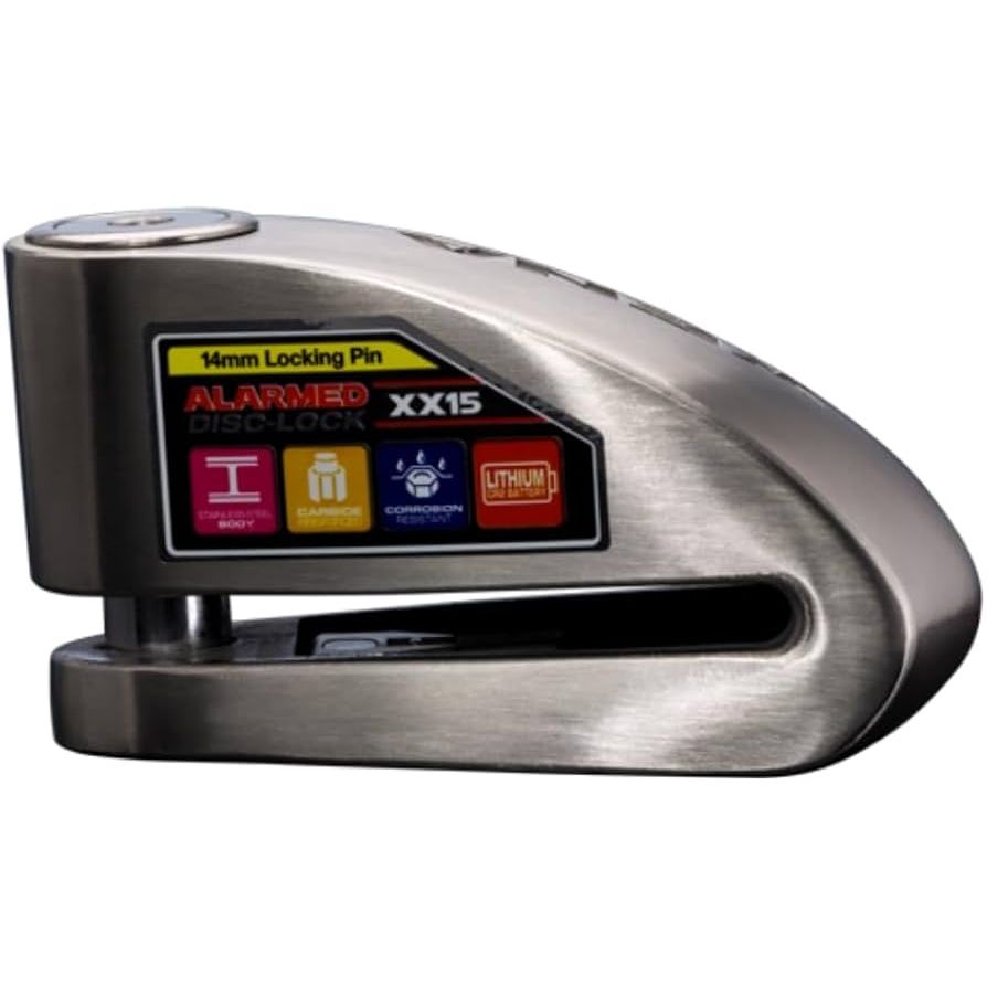 Silver metallic alarm disc lock with black locking pin and multicolored label on side.