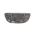 A metallic, oval-shaped Floorboard, Driver by Polaris with multiple holes and indents is shown from above on a white background, featuring a smooth finish and engraved markings that indicate it’s an OEM automotive component.