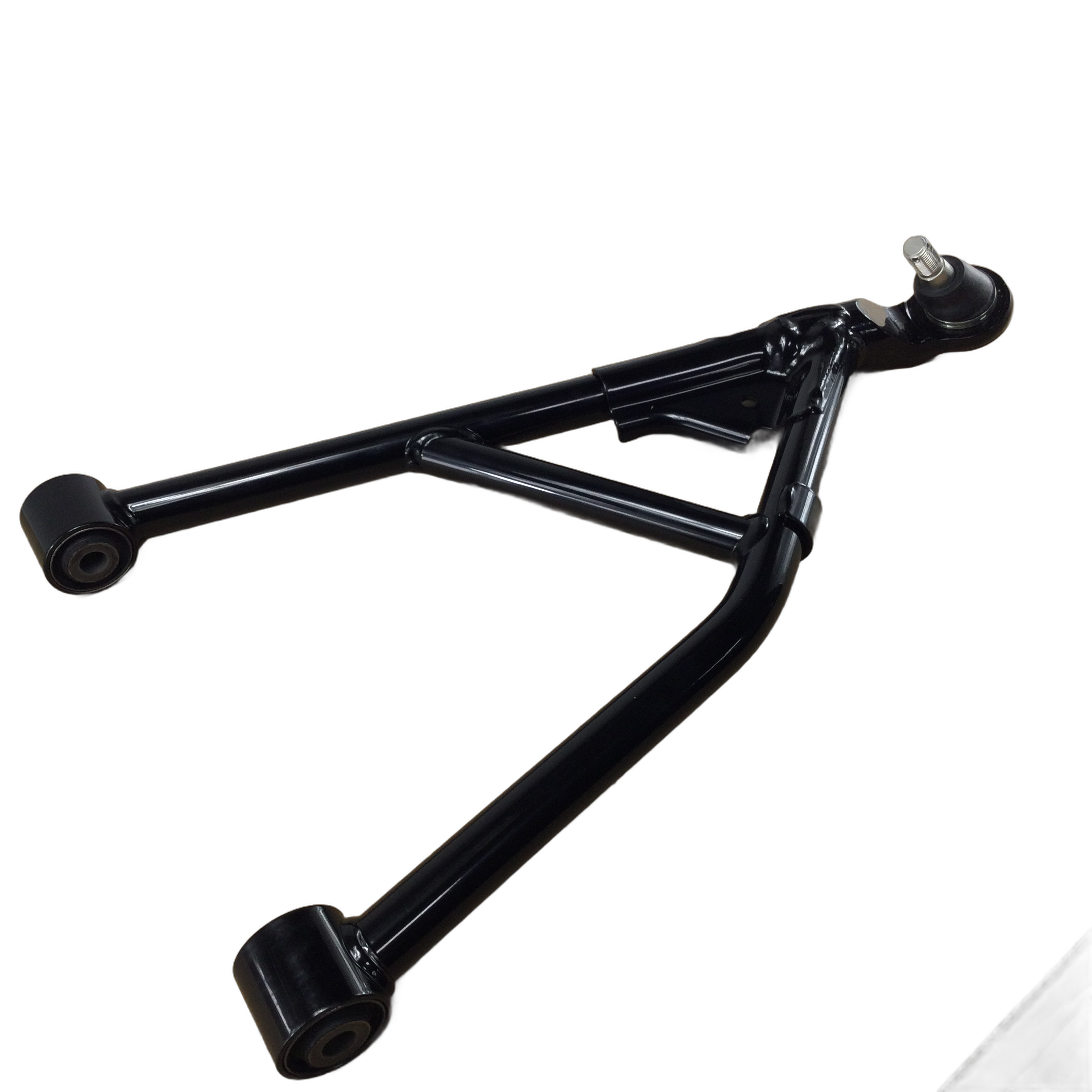 The Control Arm Assembly, Right Front (Lower) *Nh1* (Black) by Honda for UTVs features two rubber bushings on one end and a ball joint on the other, ideal for off-road OEM use, shown isolated on a white background.