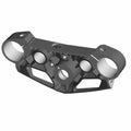 A 3D-rendered image of the Upper Triple Tree Clamp Flat Black by Polaris, designed for Victory motorcycles. Featuring multiple circular openings and angular supports, this robust part resembles OEM hardware with precise mounting holes.