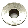 Metal valve spring retainer with central hole, circular and slightly worn surface.