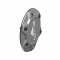 Brushed metal stator cover badge with silver finish and engraved Polaris logo, oval shape with six bolt holes.