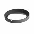 Matte black circular headlight bezel with smooth finish and mounting hole.