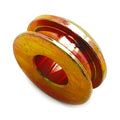 Yellow-gold metal circular pivot seal cap with central groove and hollow center hole.
