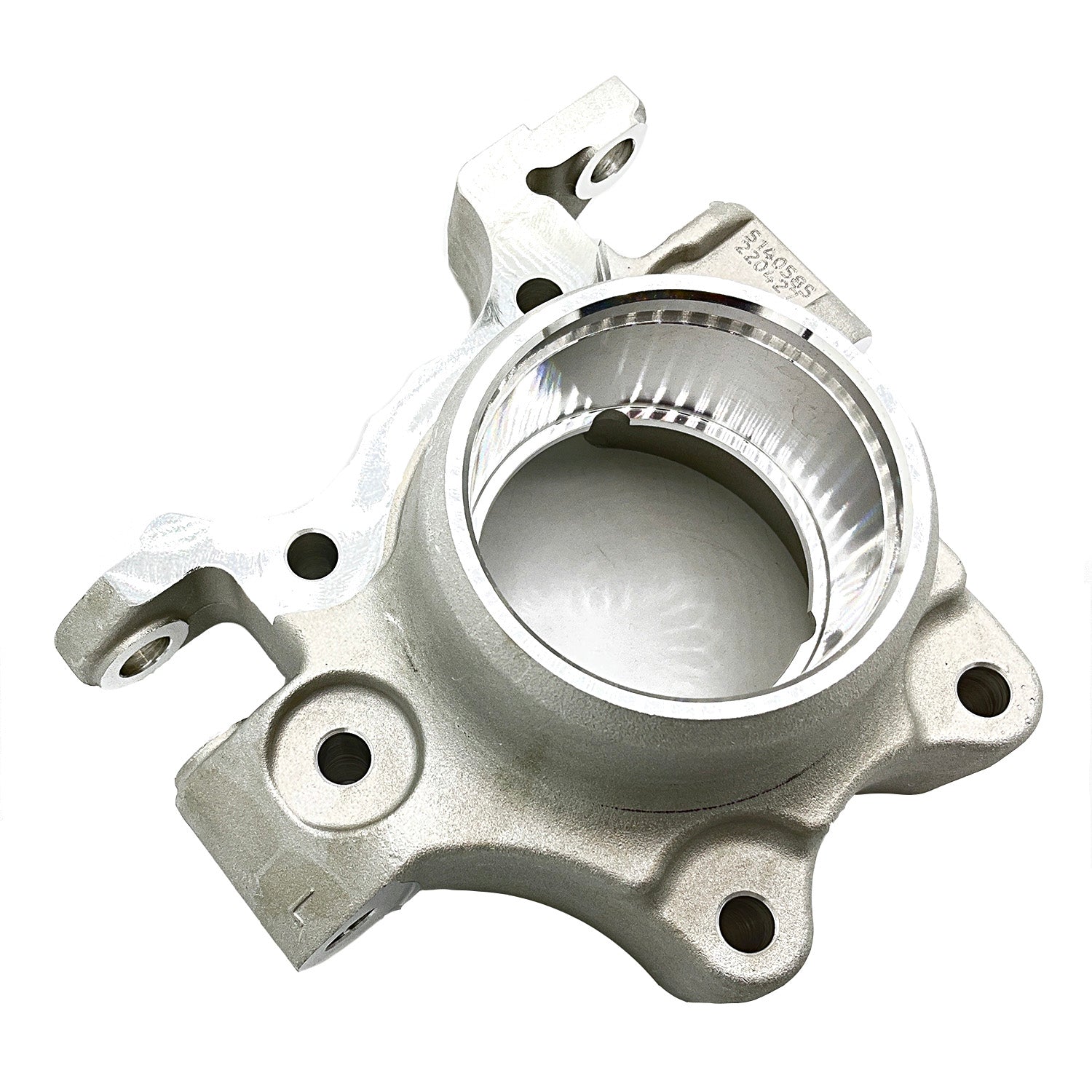 Silver metal steering knuckle with circular central hub and multiple mounting holes.