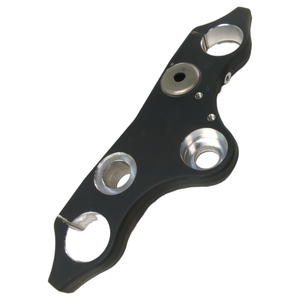Flat black metal triple tree clamp with three circular cutouts and smooth finish.