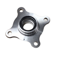 Silver metal front hub with central bearing and four mounting holes in triangular layout.