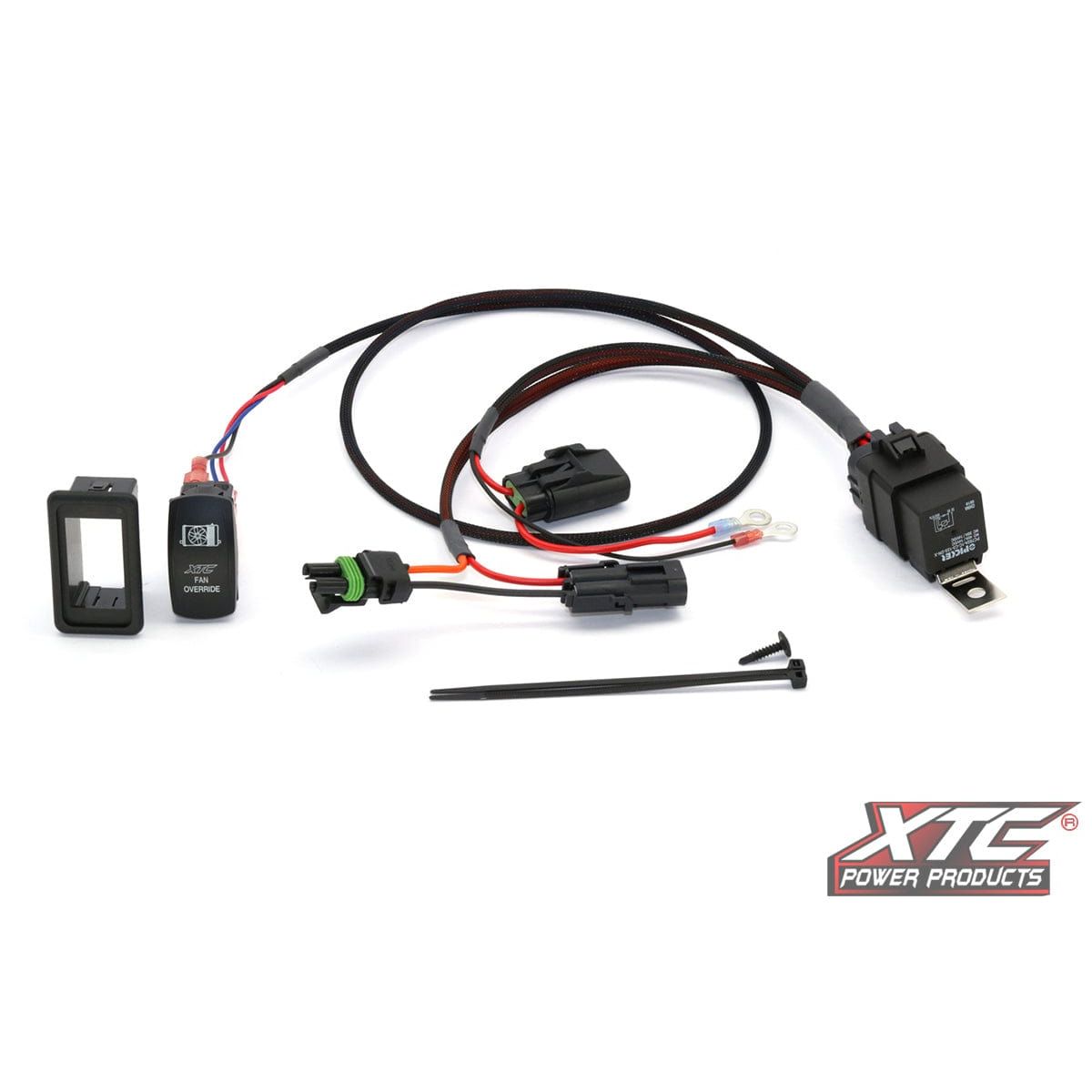 The Plug N Play Fan Override Pol by XTC Power includes a wiring harness kit with connectors, relay, two zip ties, Carling sealed rocker switch with red LED, diode protection, and mounting bracket; XTC Power logo shown.