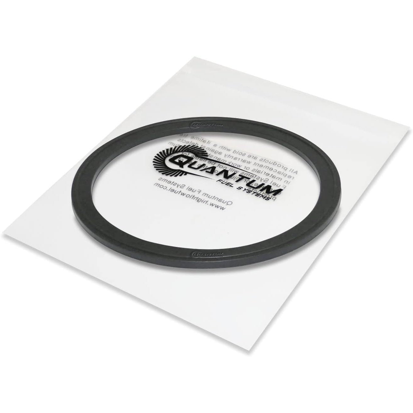 Black circular fuel tank seal gasket on a transparent plastic sheet with Quantum branding text beneath.