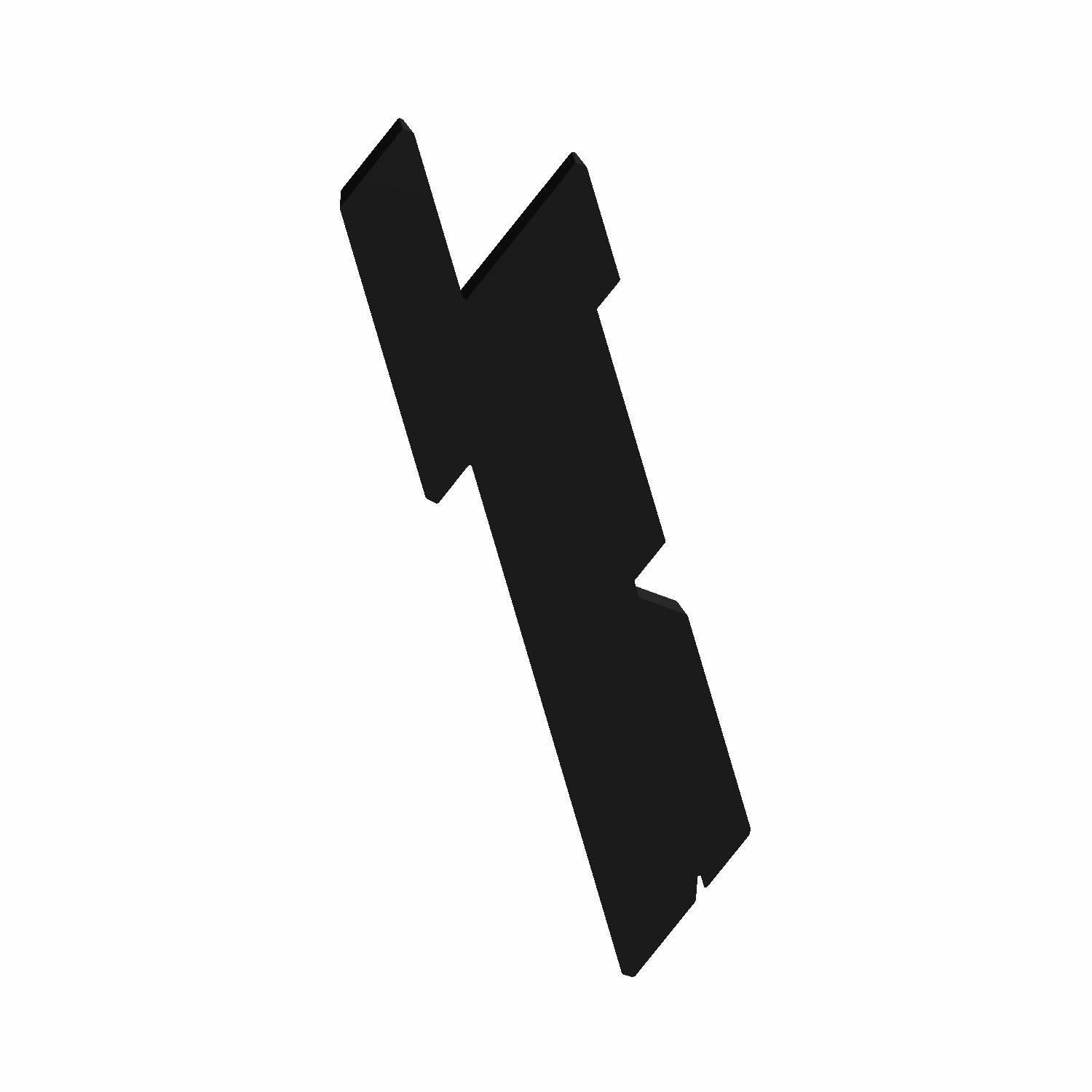 Matte black angular plastic badge with sharp, geometric cutouts and a layered design.