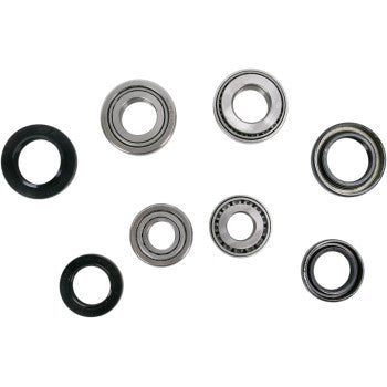The Yamaha Hub Bearing Conversion Front Kit by Pivot Works features eight assorted front hub bearings and rubber seals in various sizes and finishes, including tapered roller bearings, displayed on a white background.