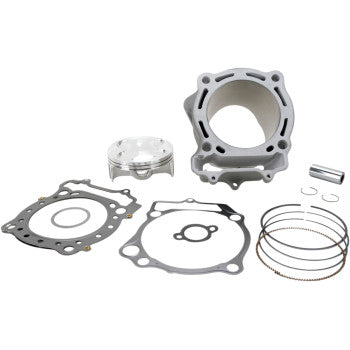 Metallic silver high-compression cylinder kit with piston, multiple gaskets, piston rings, and small metal pin on white.