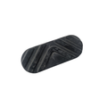 The Floorboard Pad by Polaris is a black, oval-shaped rubber pad with raised diagonal and curved grooves, designed as an OEM part for Victory motorcycles. Photographed on a white background.
