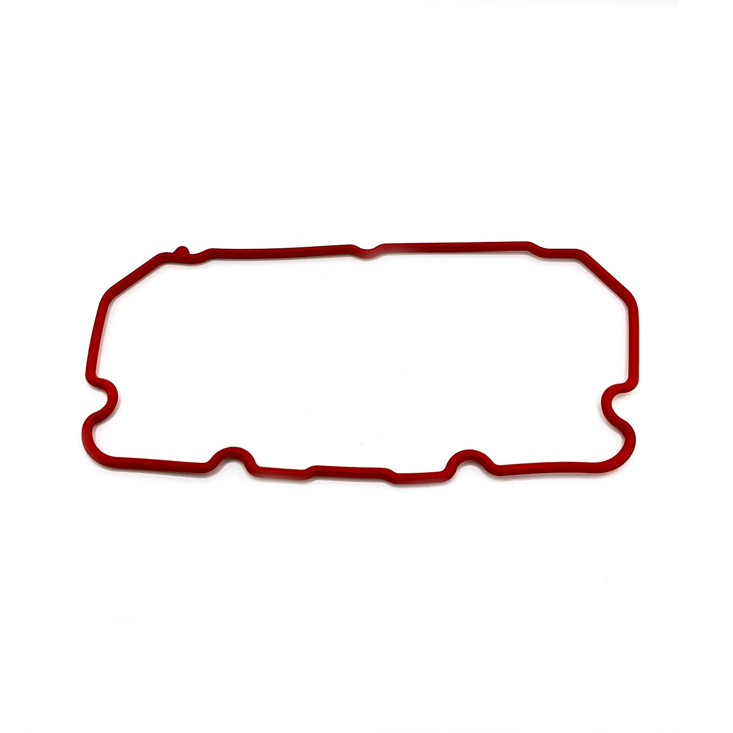 Red rubber valve cover seal gasket with irregular rectangular shape and rounded edges.