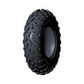 Black off-road tire with deep aggressive tread pattern, rugged sidewall, 25 x 8 12 size.