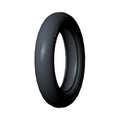 Black smooth motorcycle front tire with rounded profile and no visible tread pattern.