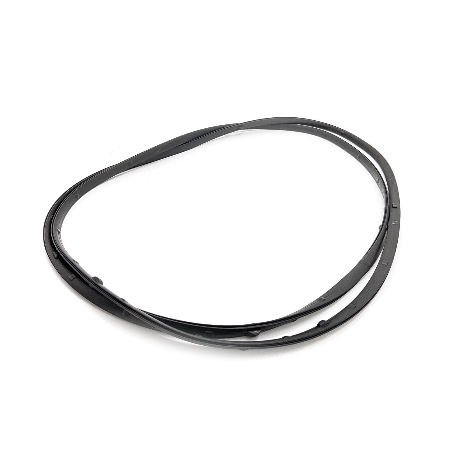 Black rubber outer clutch cover seal with smooth, flexible design and slight curvature.