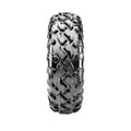 Black off-road tire with aggressive, deep tread pattern and angular lugs, designed for UTV use.